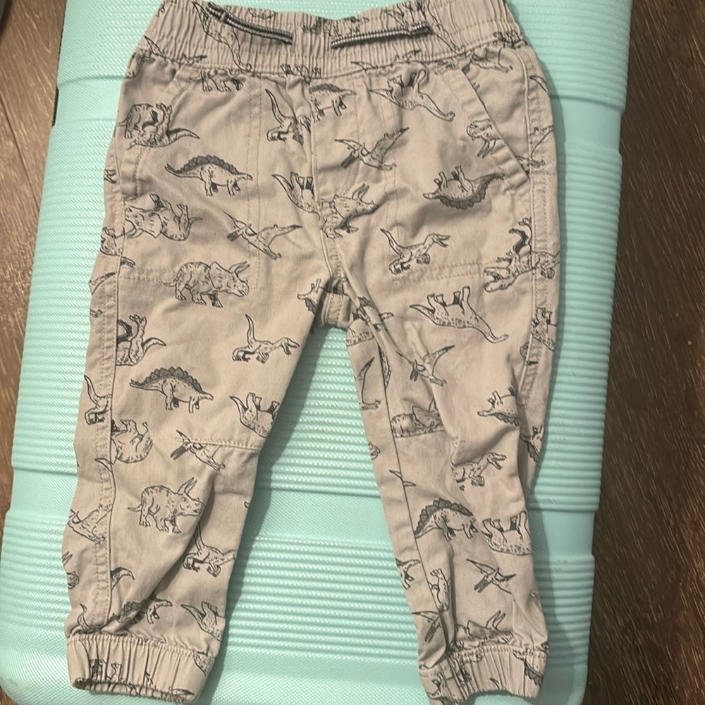 18m grey pants with black dinosaurs